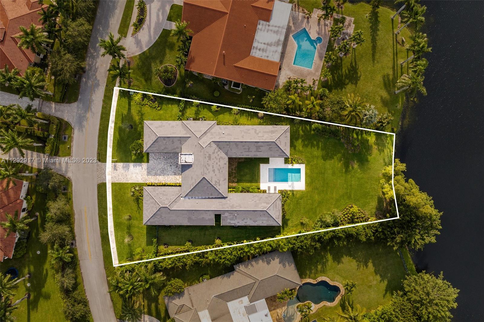 491 Ranch Road Weston, FL 33326 - Photo 43 of 46 an aerial view of a house with a garden