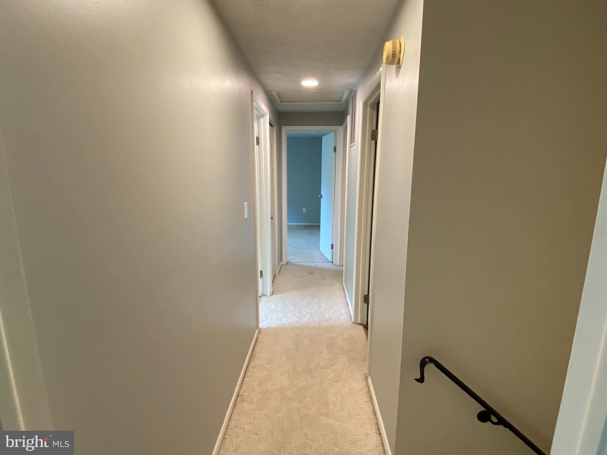 7618 Springfield Hills Drive Springfield, VA 22153 - Photo 19 of 53 Upstairs hallway standing in primary bedroom