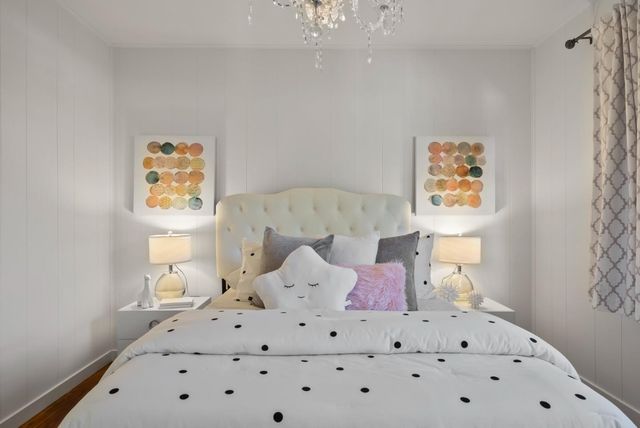 a bed room with a bed and a couch