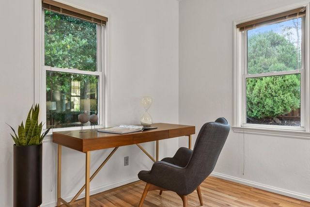 a bedroom with a bed and furniture