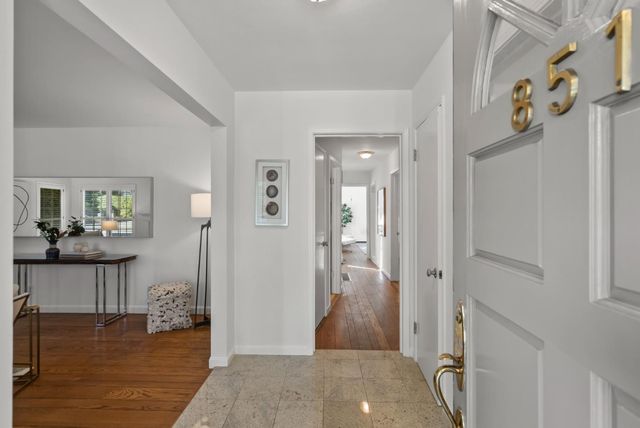 a view of entryway with livingroom and window