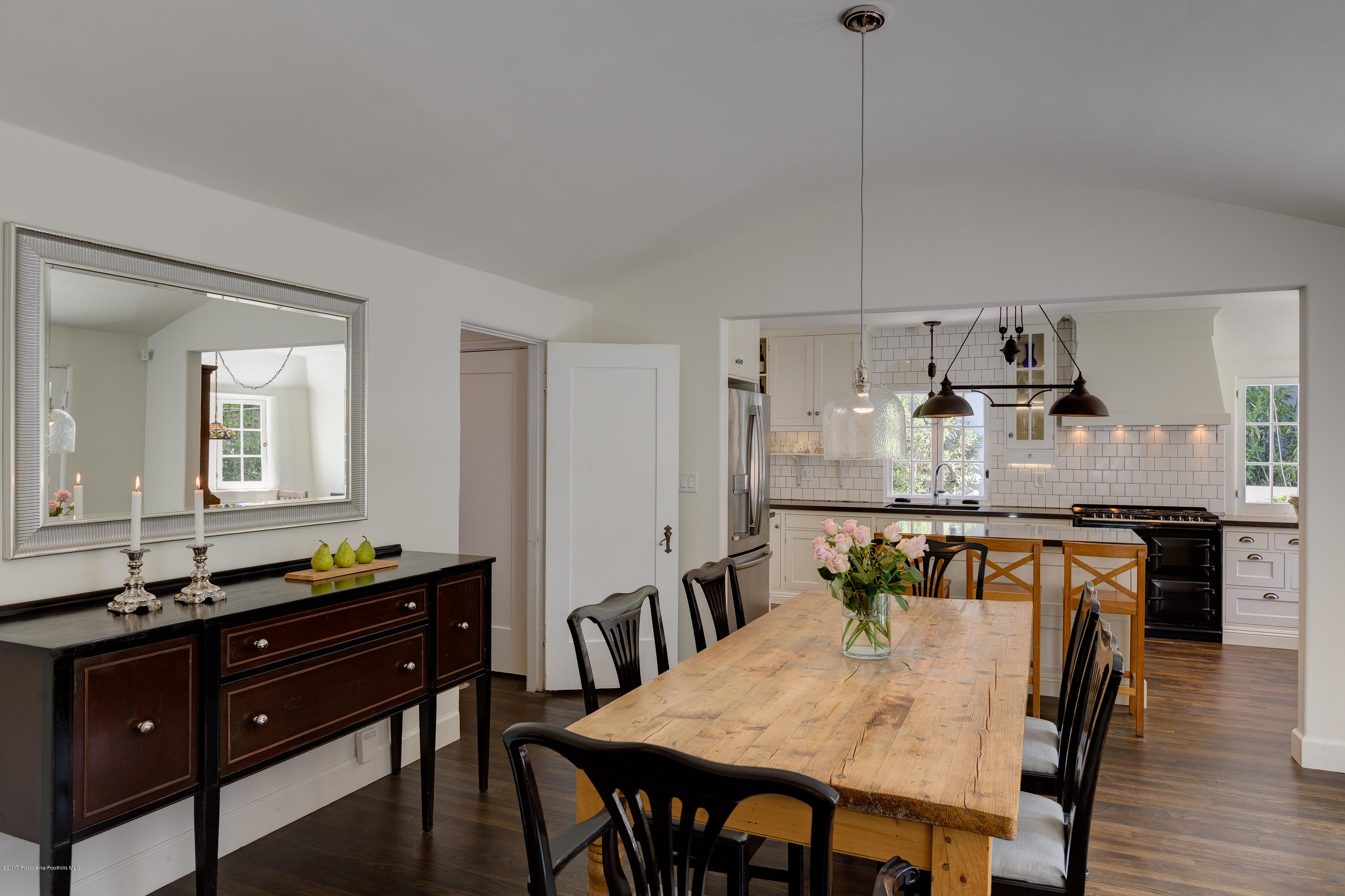 2529 Marengo Avenue Altadena, CA 91001 - Photo 14 of 42 a kitchen with kitchen island granite countertop a table and chairs in it