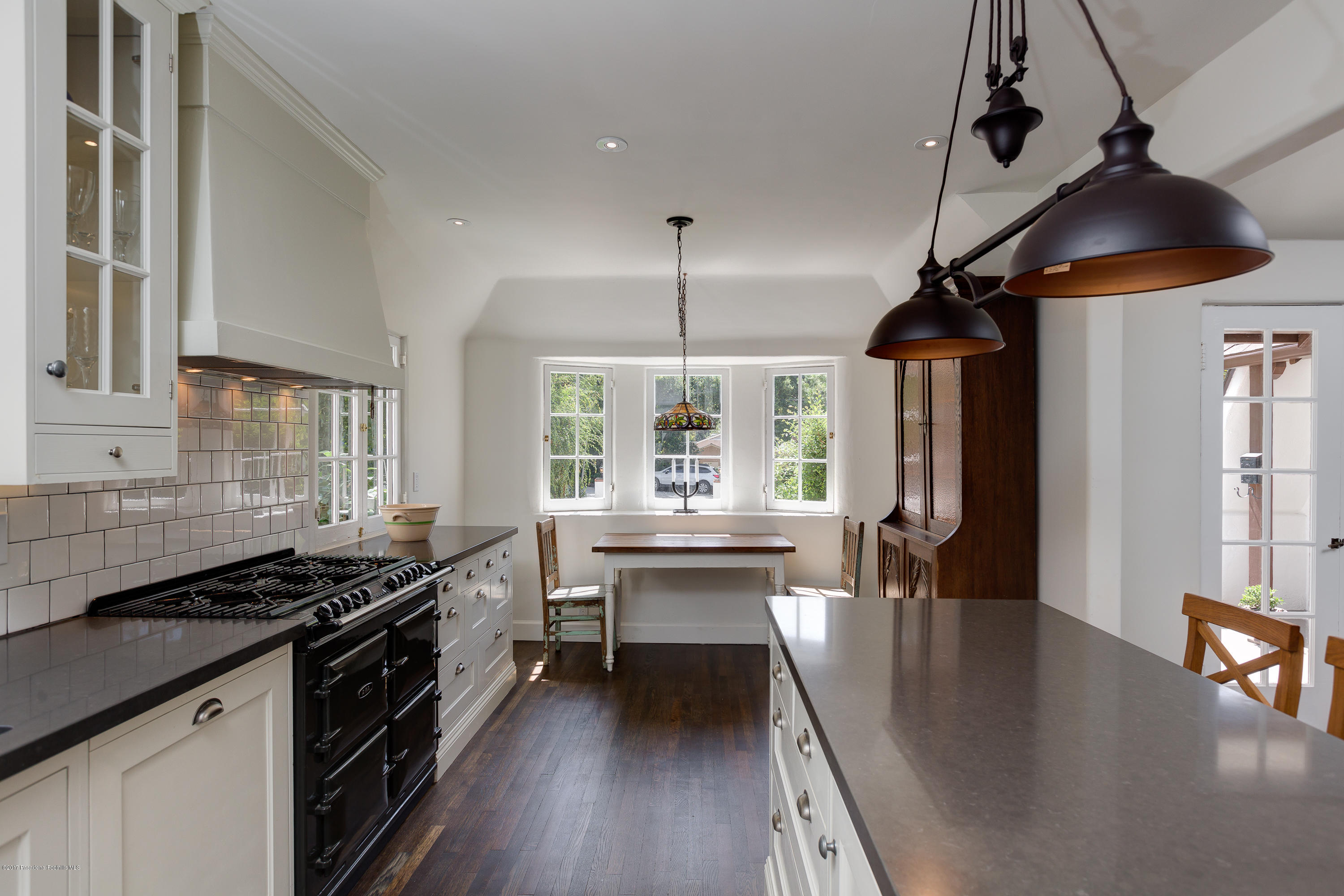 2529 Marengo Avenue Altadena, CA 91001 - Photo 18 of 42 a kitchen with stainless steel appliances granite countertop a stove a sink and a refrigerator