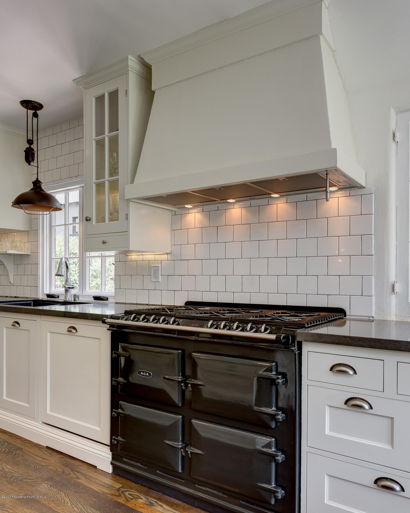 2529 Marengo Avenue Altadena, CA 91001 - Photo 20 of 42 a kitchen with stainless steel appliances a stove and a sink