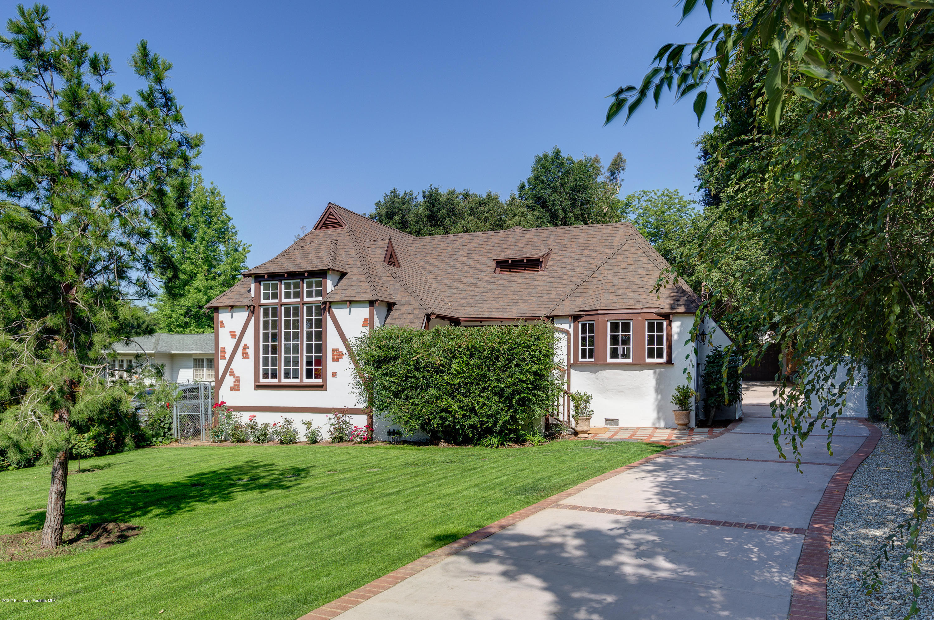 2529 Marengo Avenue Altadena, CA 91001 - Photo 3 of 42 a front view of a house with a yard