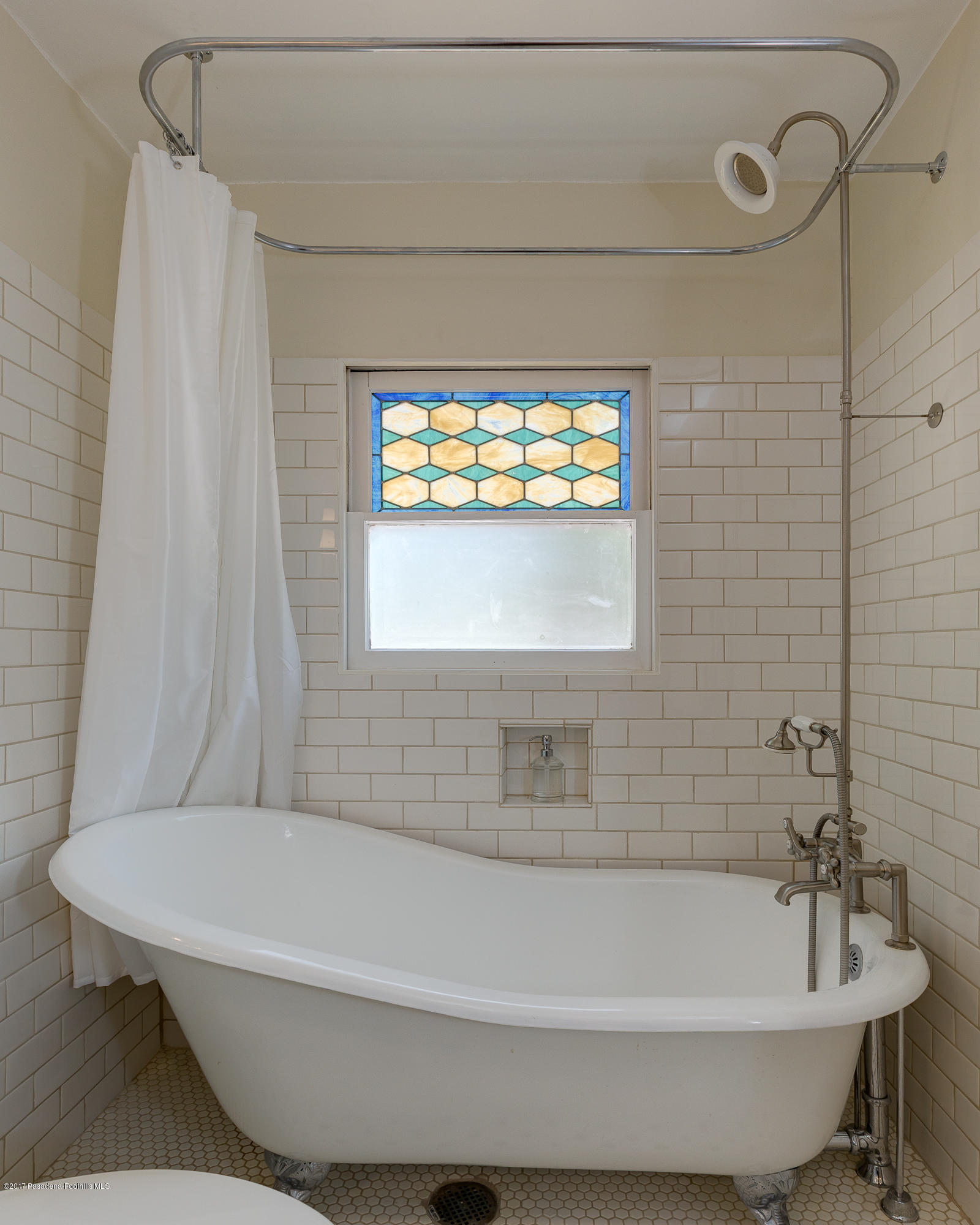 2529 Marengo Avenue Altadena, CA 91001 - Photo 29 of 42 a bathroom with a bathtub and a shower