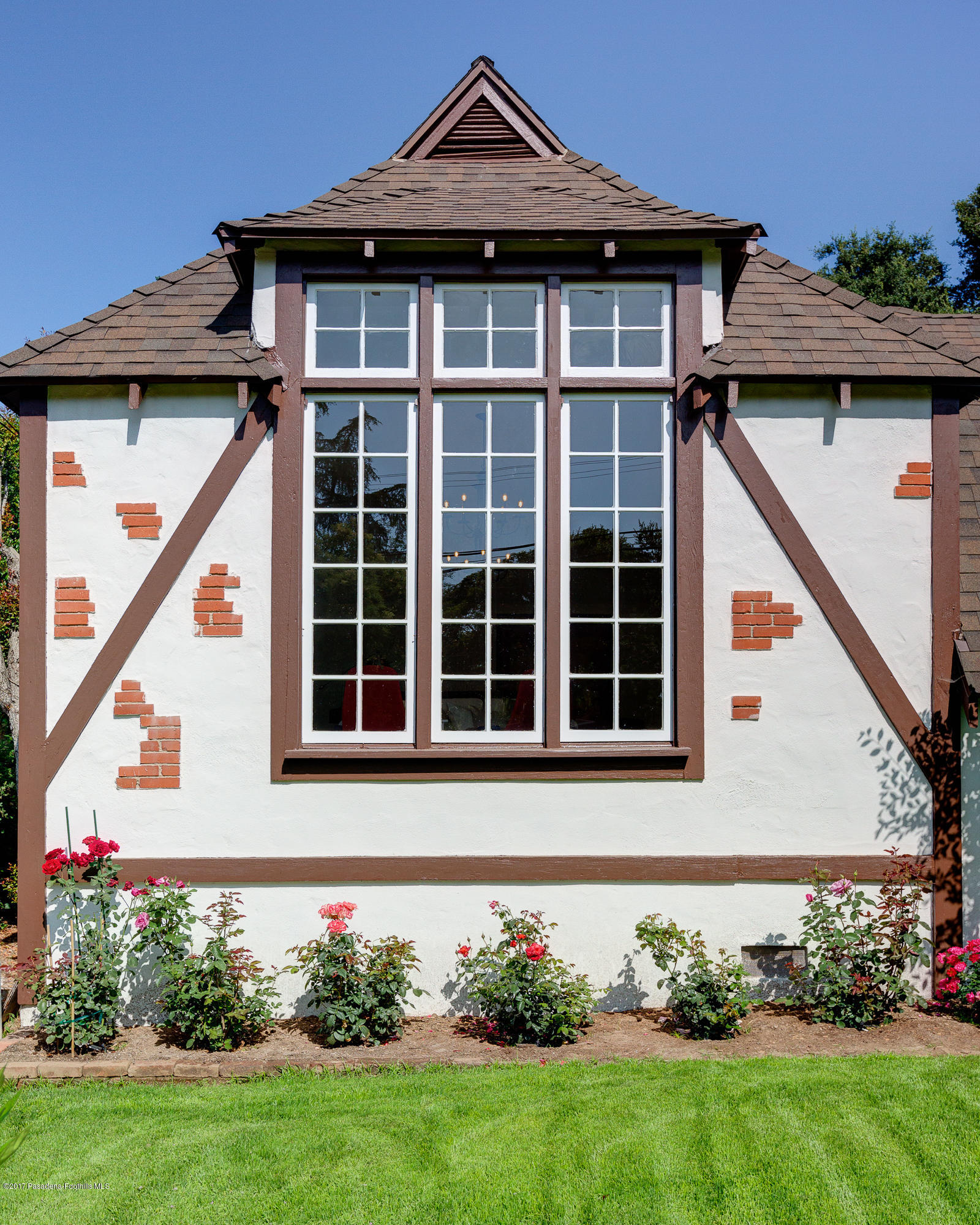 2529 Marengo Avenue Altadena, CA 91001 - Photo 4 of 42 a front view of a house with a yard