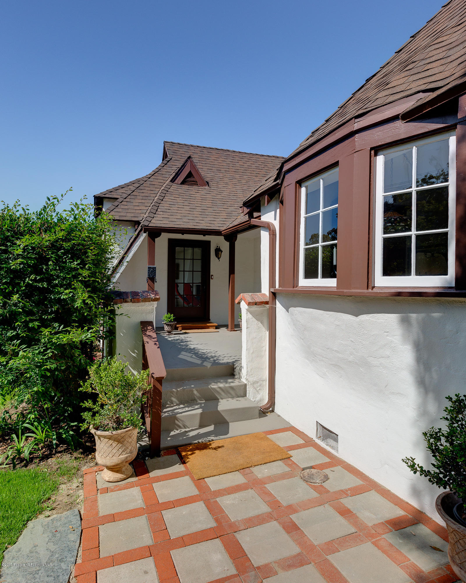 2529 Marengo Avenue Altadena, CA 91001 - Photo 5 of 42 a front view of a house with a yard