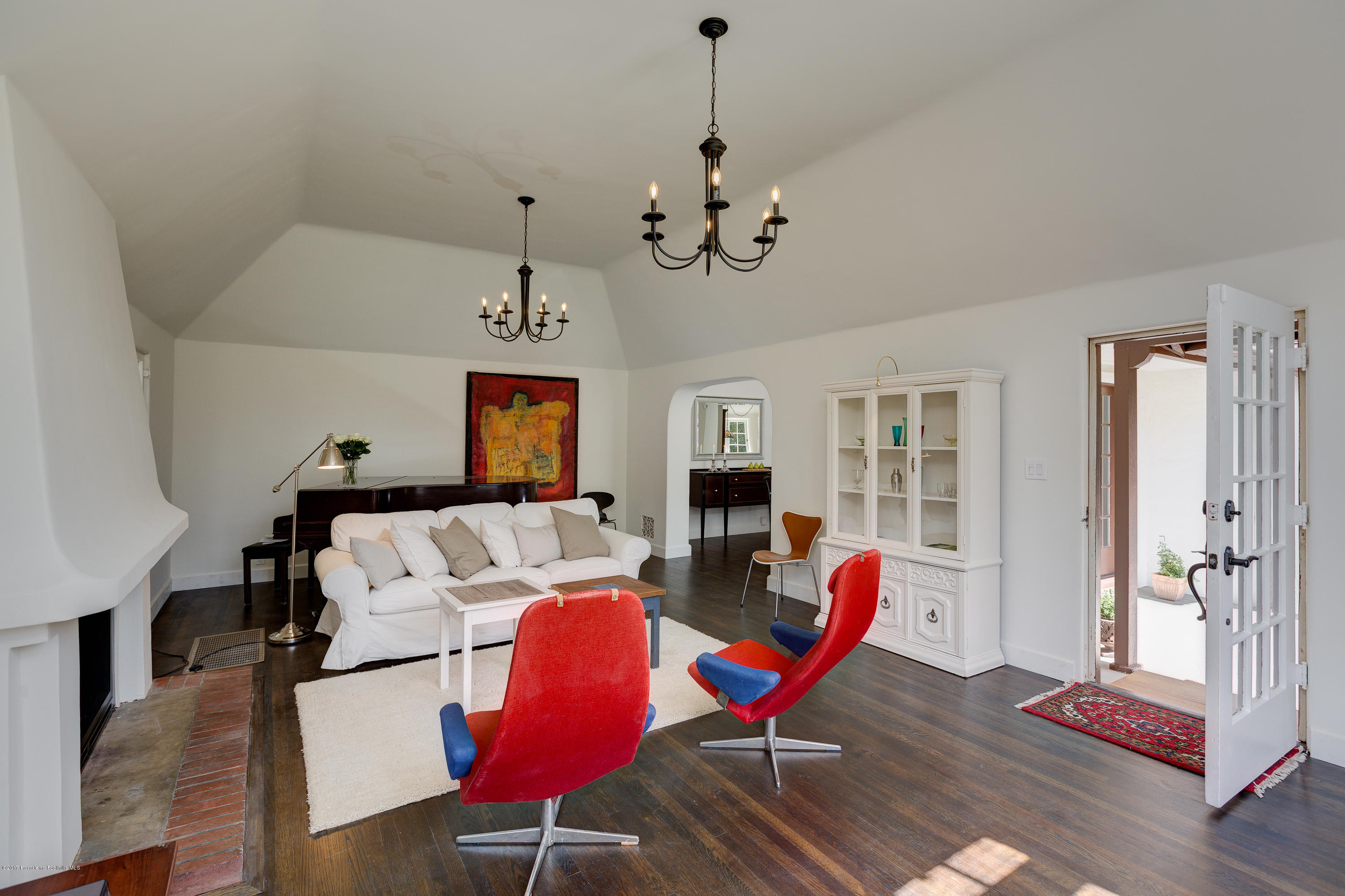 2529 Marengo Avenue Altadena, CA 91001 - Photo 8 of 42 a living room with furniture a table and wooden floor