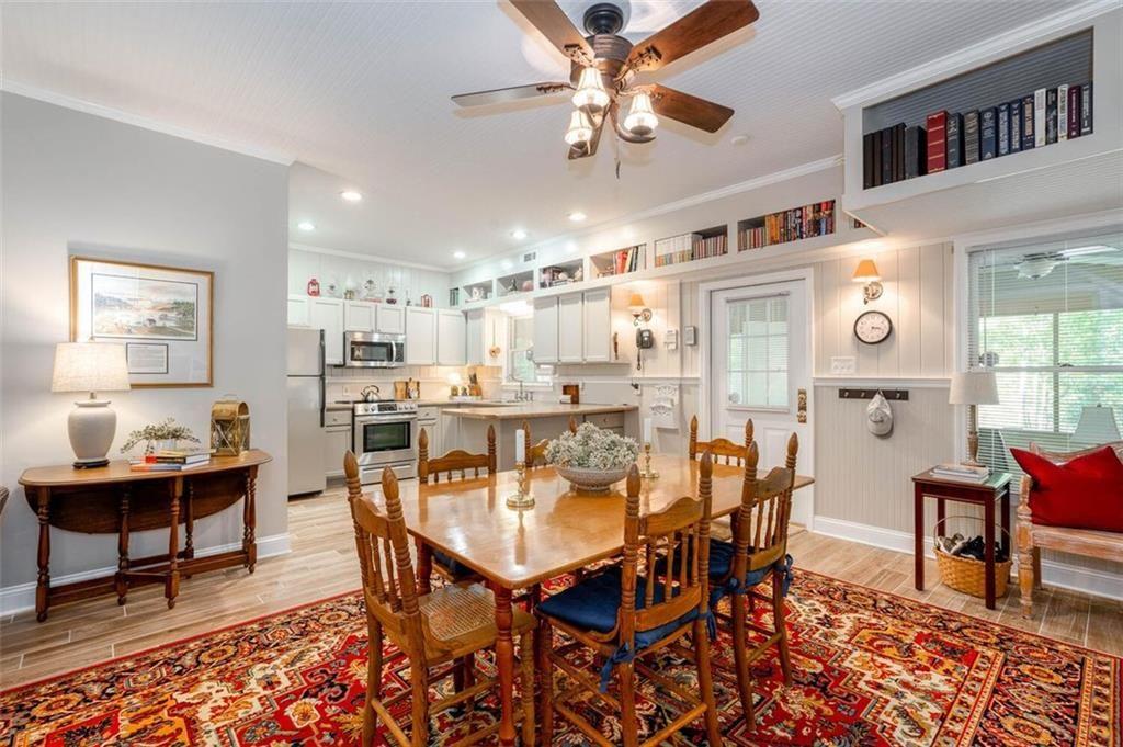 0 Vinson Mountain Road Rockmart, GA 30153 - Photo 14 of 48 a dining room with stainless steel appliances kitchen island granite countertop furniture and a rug
