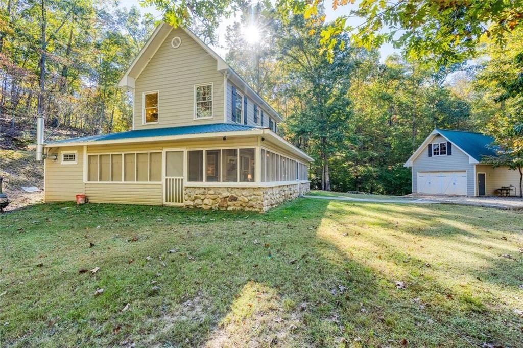 0 Vinson Mountain Road Rockmart, GA 30153 - Photo 42 of 48 a view of a house with backyard and sitting area