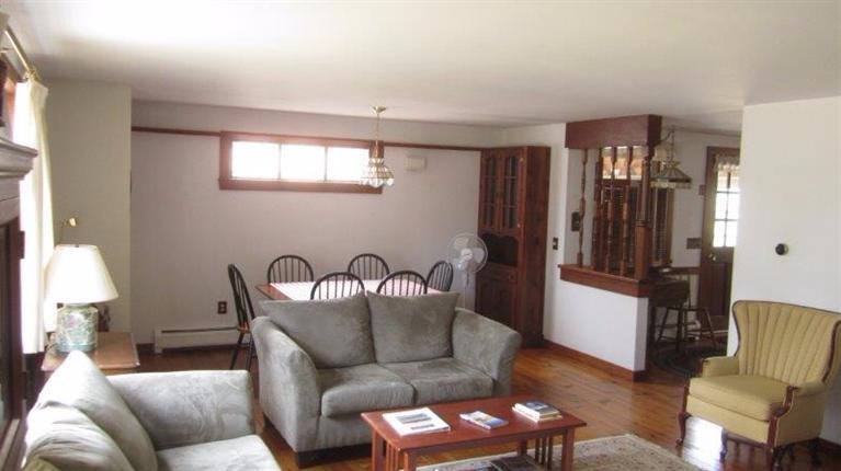 65 Upper Marsh Road Wellfleet, MA 02667 - Photo 11 of 24 a living room with furniture and a window