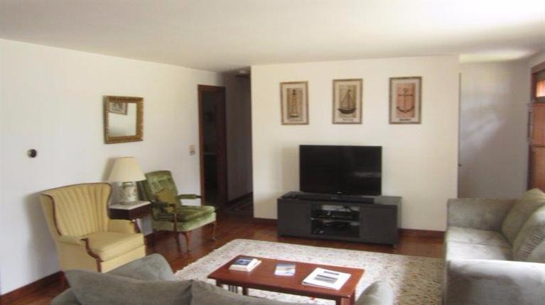65 Upper Marsh Road Wellfleet, MA 02667 - Photo 12 of 24 a living room with furniture and a flat screen tv
