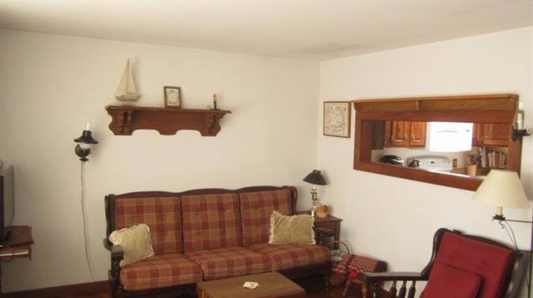 65 Upper Marsh Road Wellfleet, MA 02667 - Photo 14 of 24 a living room with furniture