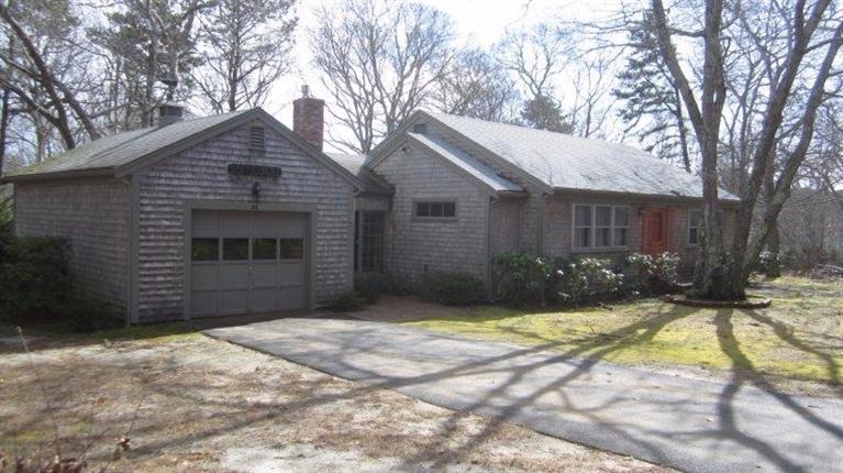 65 Upper Marsh Road Wellfleet, MA 02667 - Photo 2 of 24 a view of a house with a yard