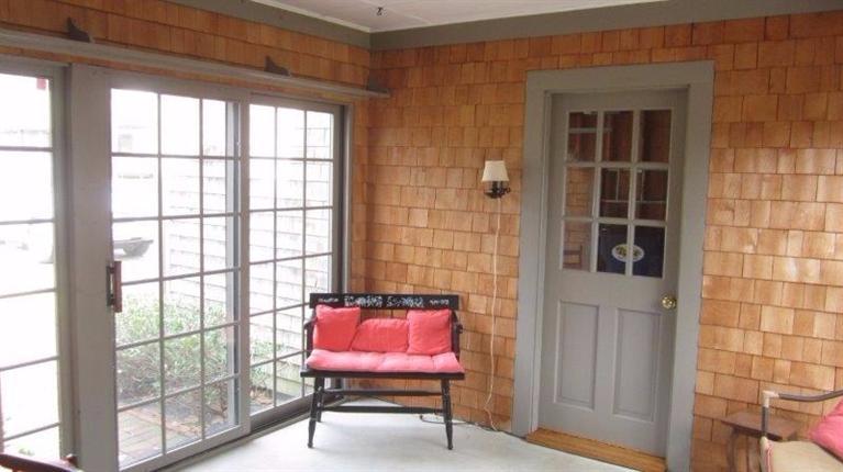 65 Upper Marsh Road Wellfleet, MA 02667 - Photo 22 of 24 a room with furniture and windows