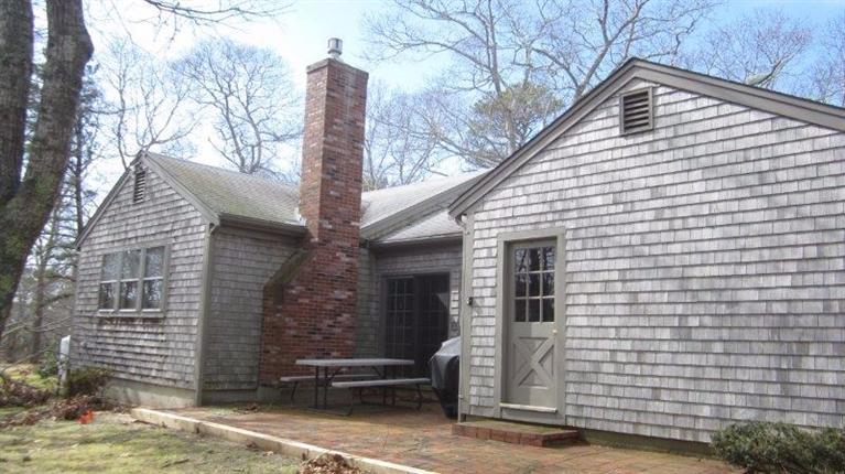 65 Upper Marsh Road Wellfleet, MA 02667 - Photo 5 of 24 a front view of a house