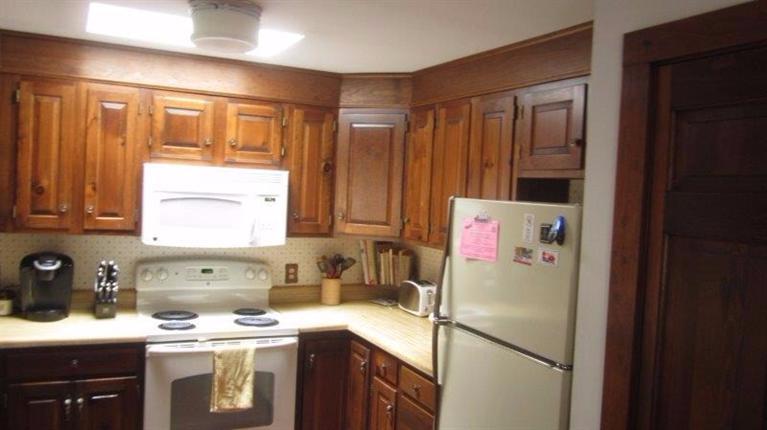 65 Upper Marsh Road Wellfleet, MA 02667 - Photo 6 of 24 a utility room with a sink washer and dryer