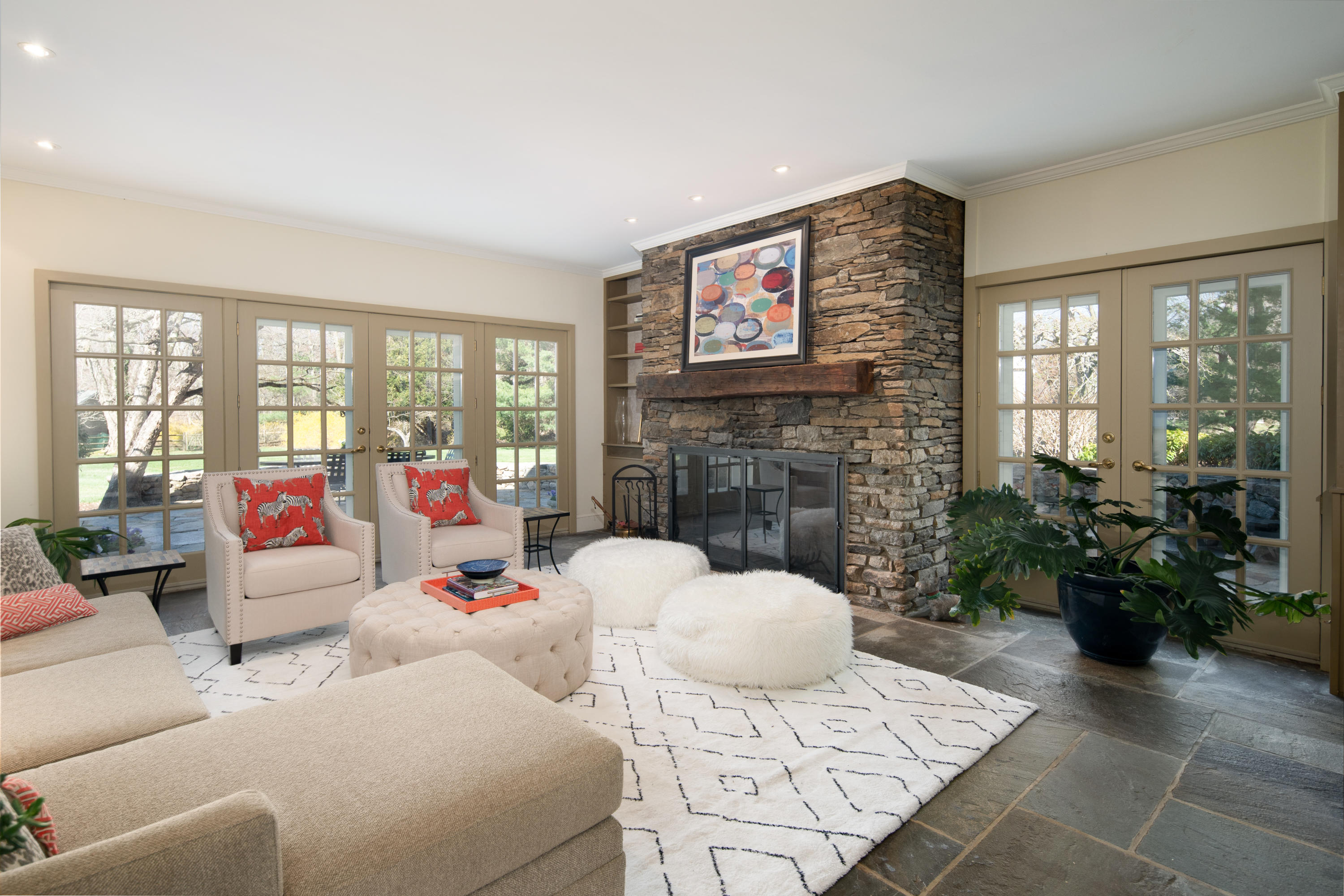 469 Brookside Road New Canaan, CT 06840 - Photo 15 of 39 a living room with furniture and a fireplace