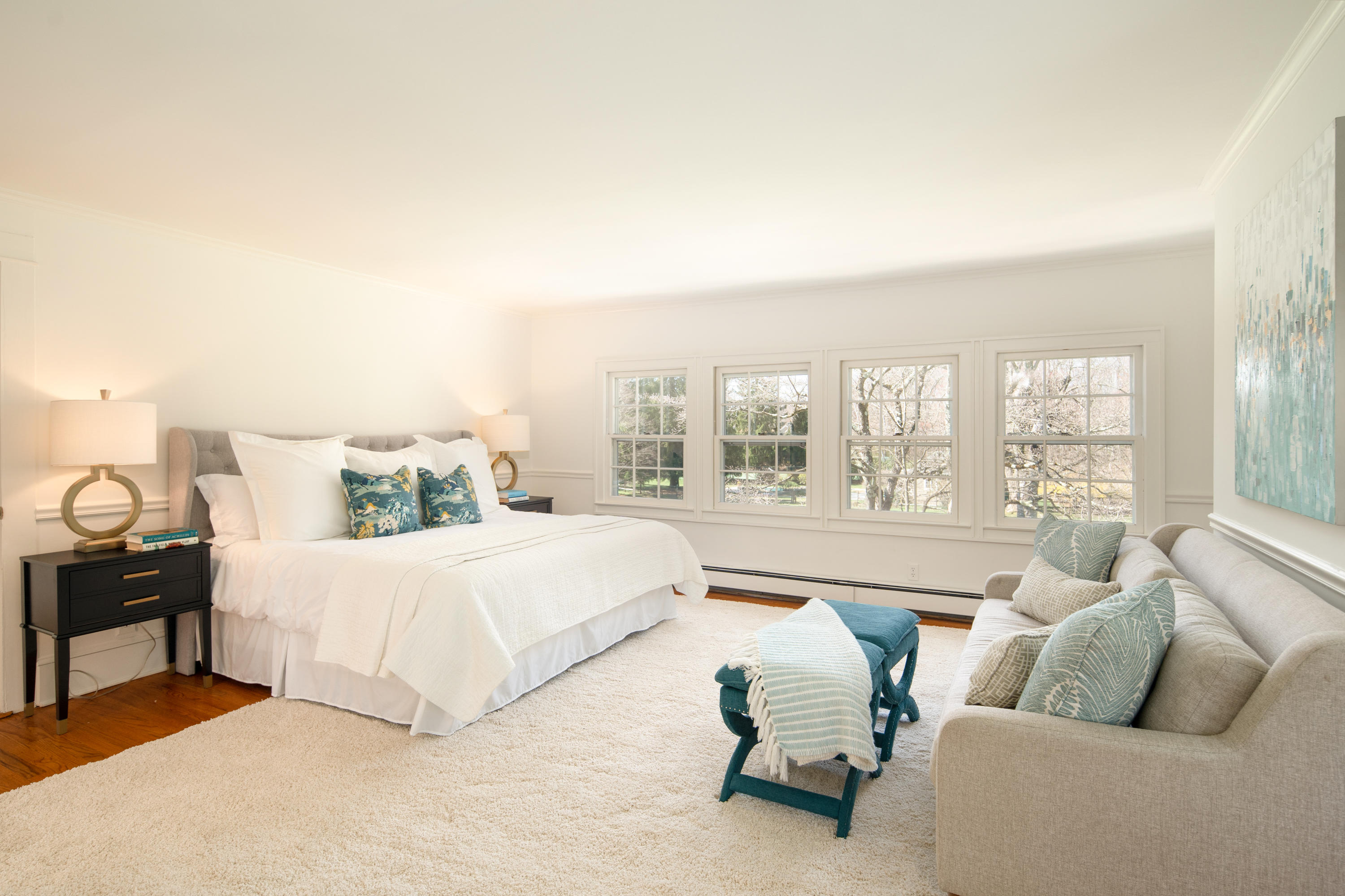 469 Brookside Road New Canaan, CT 06840 - Photo 20 of 39 a spacious bedroom with a bed and a large window