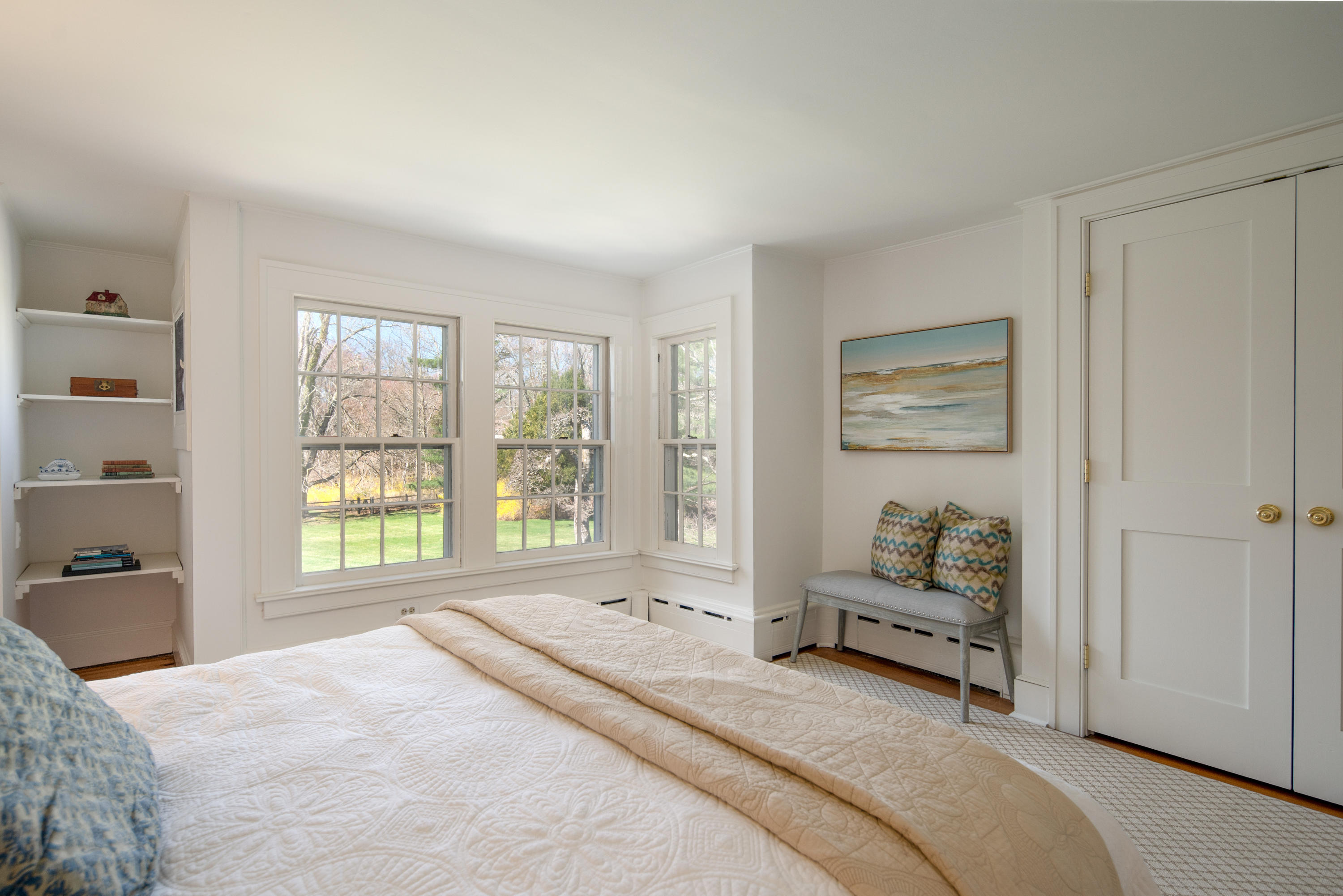 469 Brookside Road New Canaan, CT 06840 - Photo 25 of 39 a spacious bedroom with a bed and a window