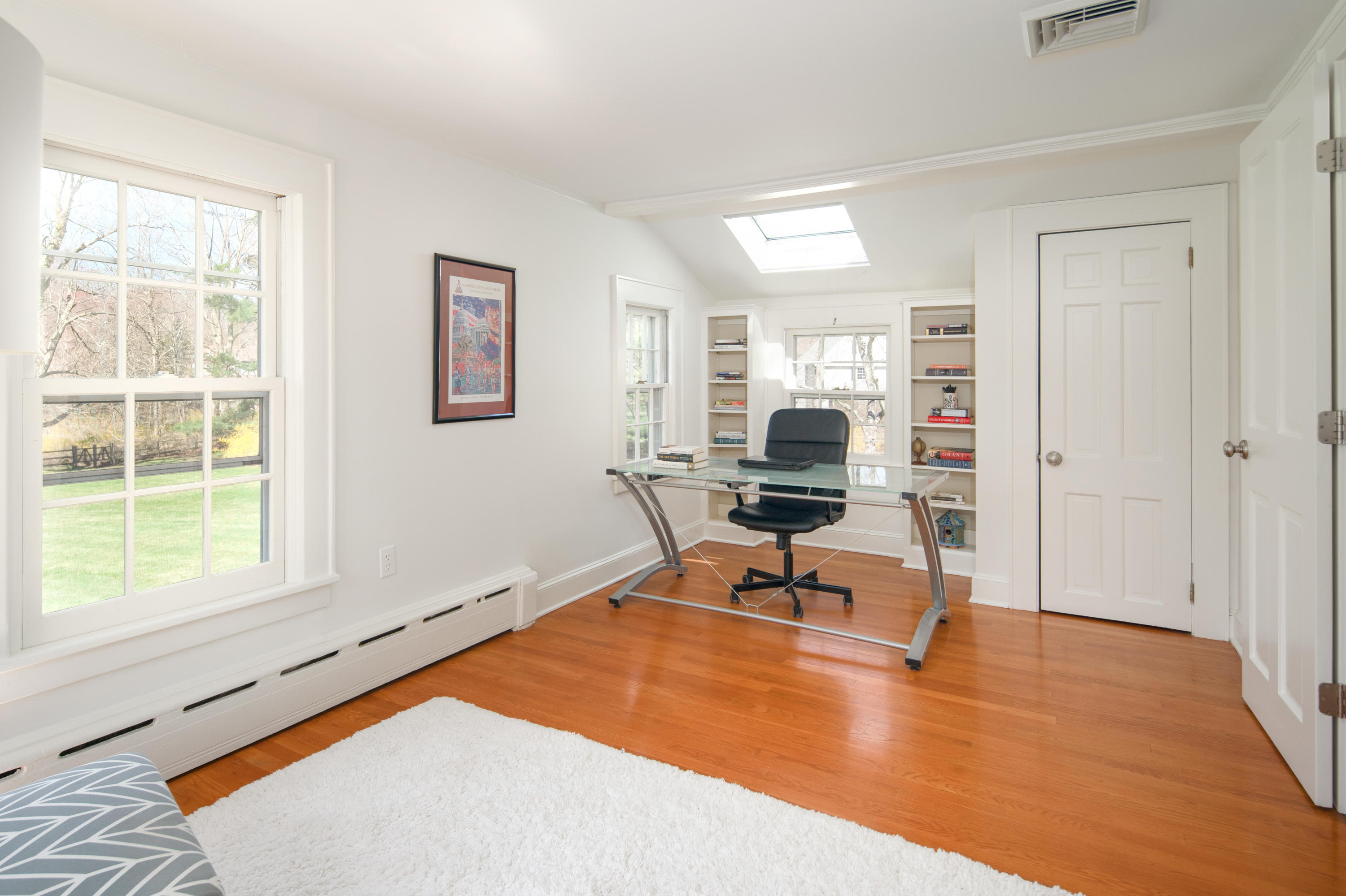 469 Brookside Road New Canaan, CT 06840 - Photo 27 of 39 a living room with furniture and a window