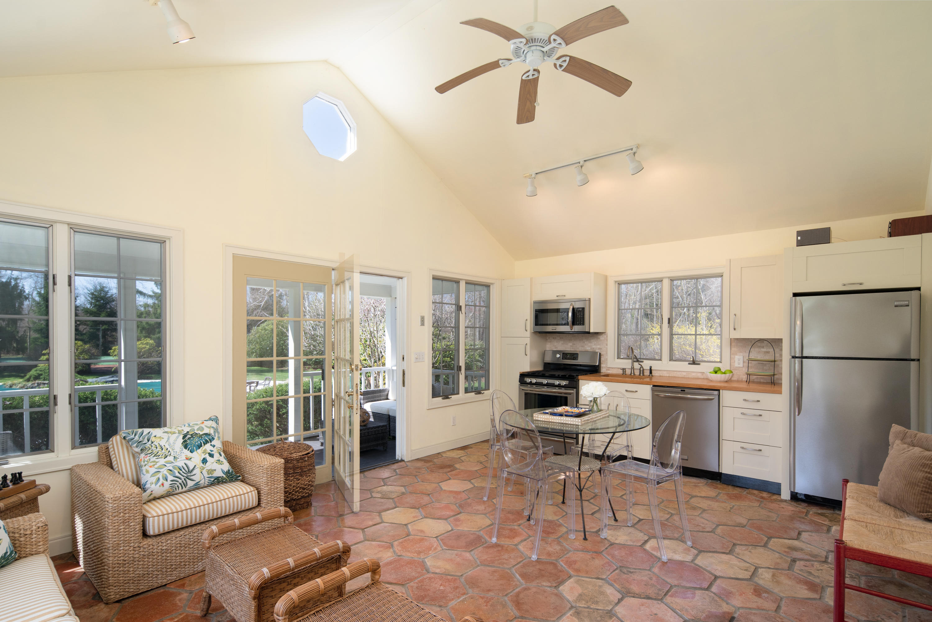469 Brookside Road New Canaan, CT 06840 - Photo 34 of 39 a living room with furniture and a large window