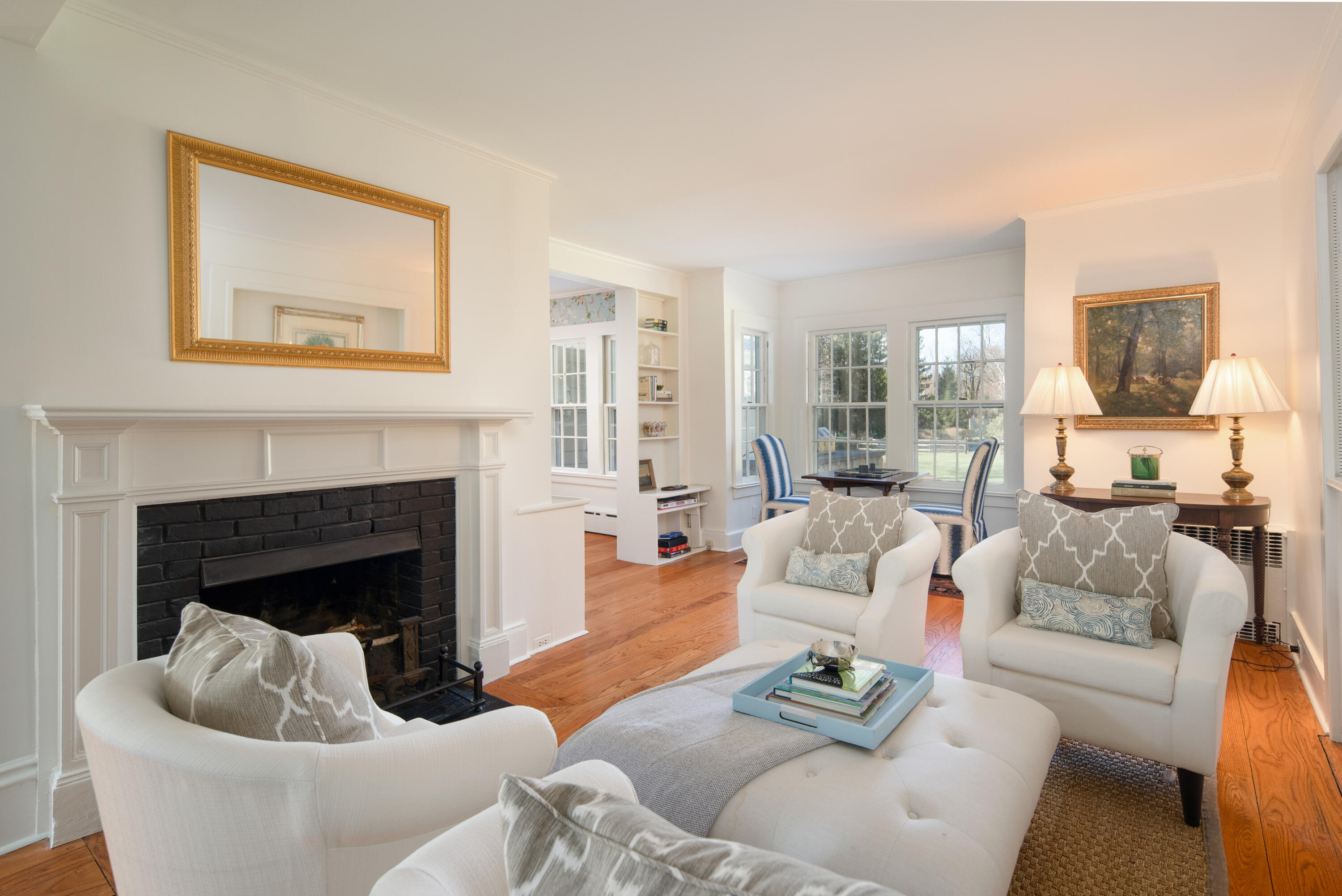 469 Brookside Road New Canaan, CT 06840 - Photo 5 of 39 a living room with furniture and a fireplace