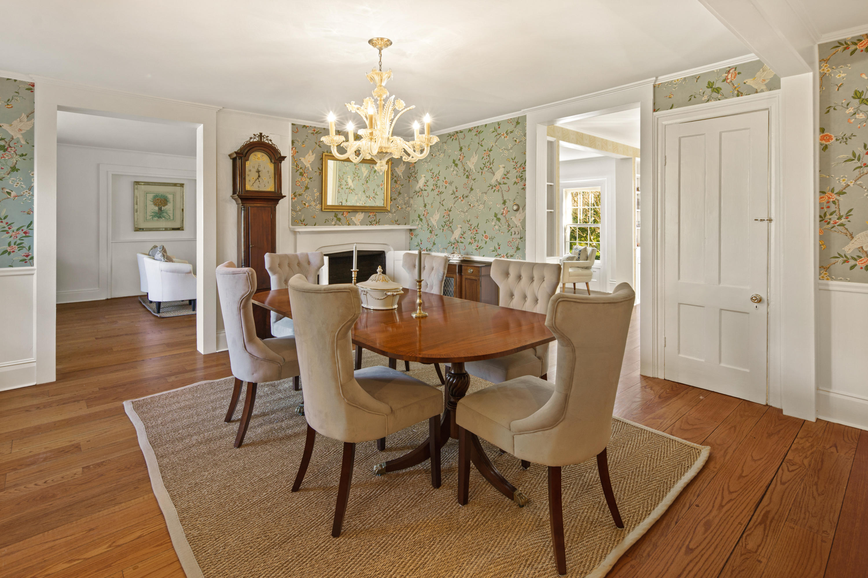 469 Brookside Road New Canaan, CT 06840 - Photo 7 of 39 a view of a dining room with furniture a chandelier and wooden floor
