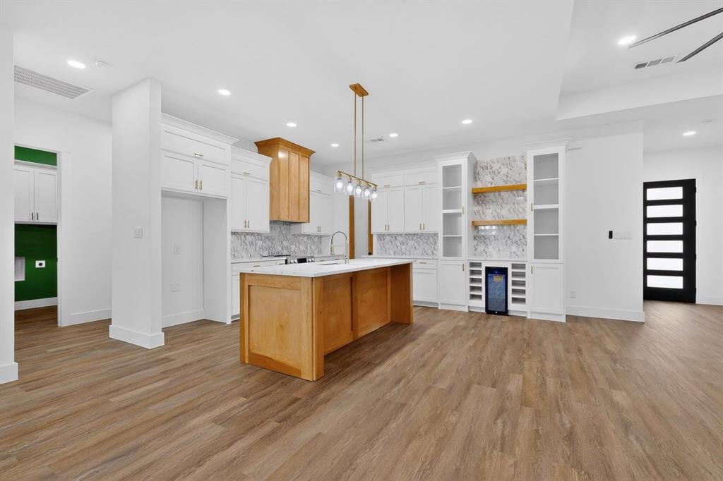 4737 Pine Ridge Court Athens, TX 75752 - Photo 5 of 26 a view of kitchen with cabinets and wooden floor