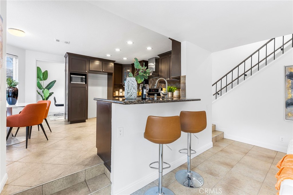 39 Viewpoint Circle Pomona, CA 91766 - Photo 20 of 49 a living room with furniture and a painting