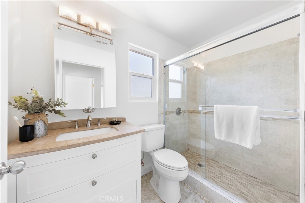 39 Viewpoint Circle Pomona, CA 91766 - Photo 40 of 49 a bathroom with a sink a toilet and shower