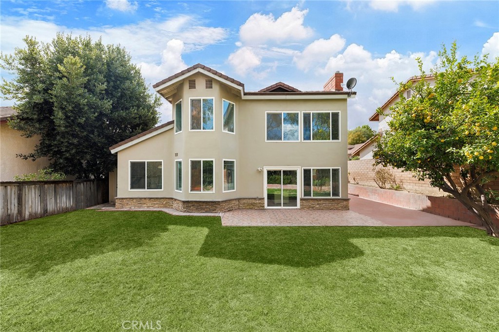 39 Viewpoint Circle Pomona, CA 91766 - Photo 42 of 49 a front view of a house with a yard and porch