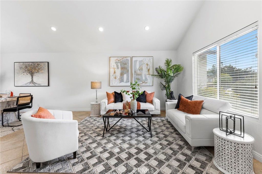 39 Viewpoint Circle Pomona, CA 91766 - Photo 9 of 49 a living room with furniture and a potted plant