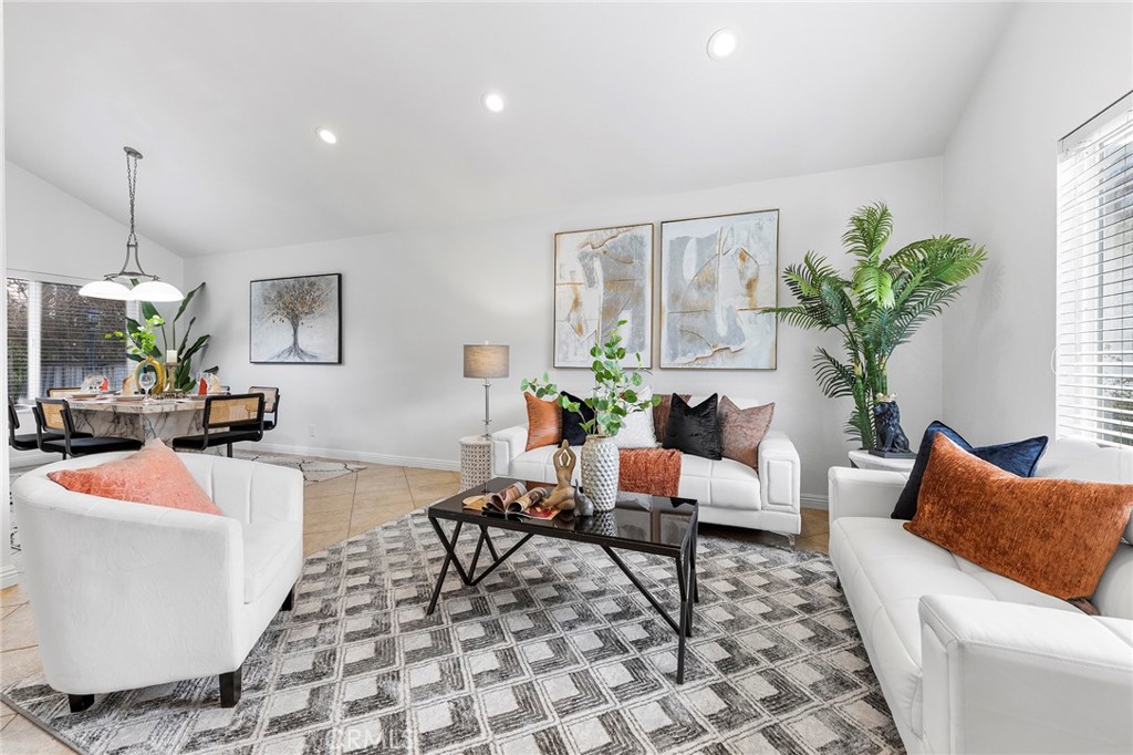 39 Viewpoint Circle Pomona, CA 91766 - Photo 10 of 49 a living room with furniture and a potted plant