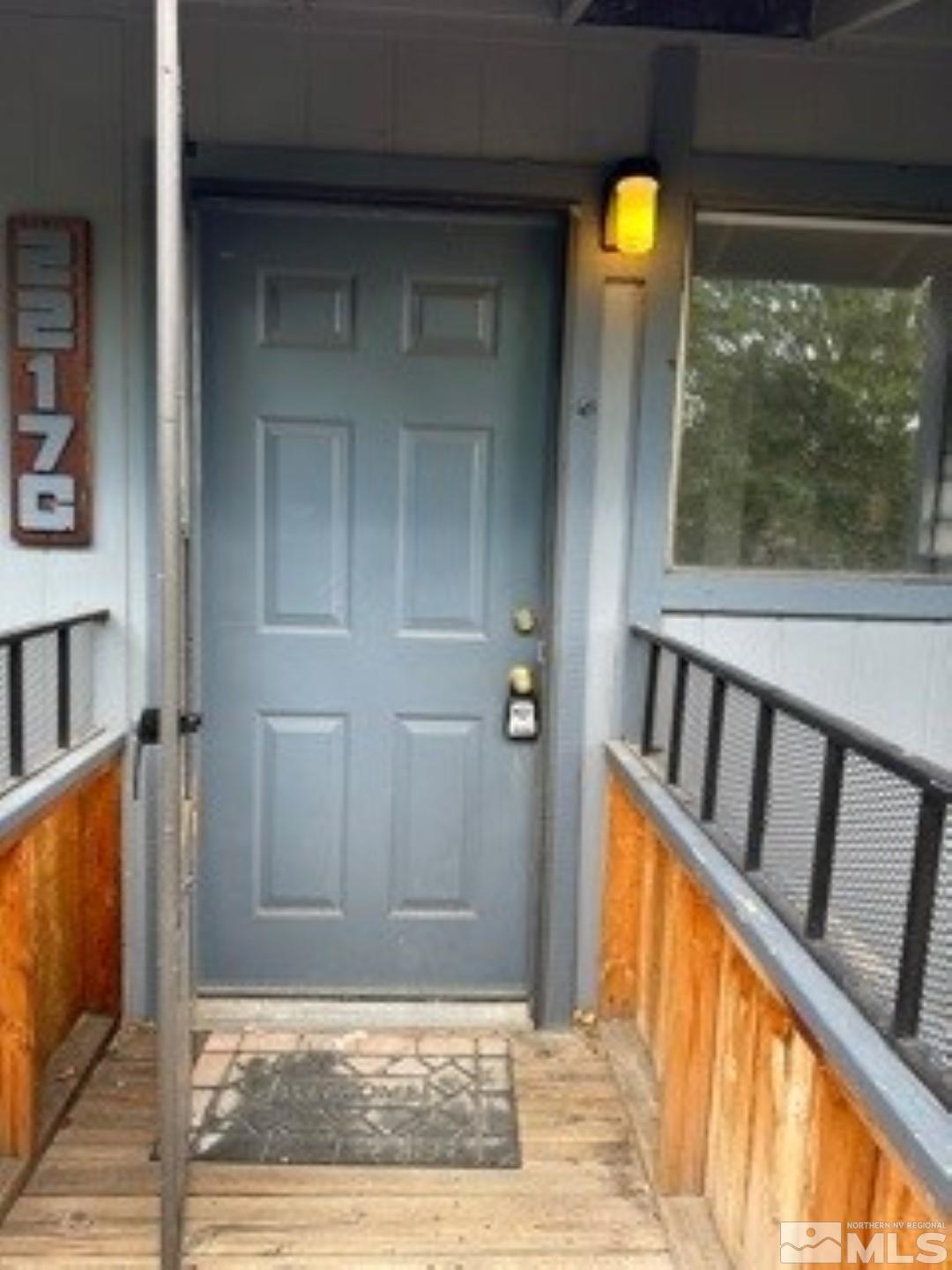 a view of a porch with a door