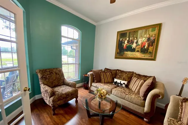 a living room with furniture and a window