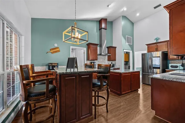 a view of a workspace with furniture