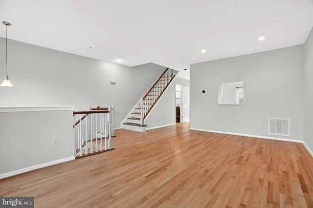 a view of entryway with wooden floor
