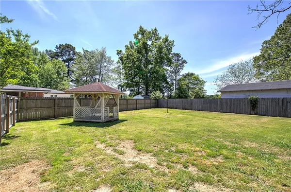 a swimming pool view with a outdoor space