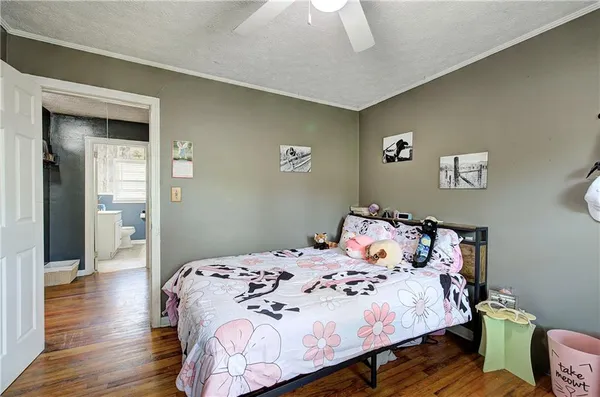 a view of a lake with houses in the back