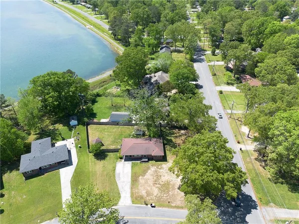 a view of a garden with a building