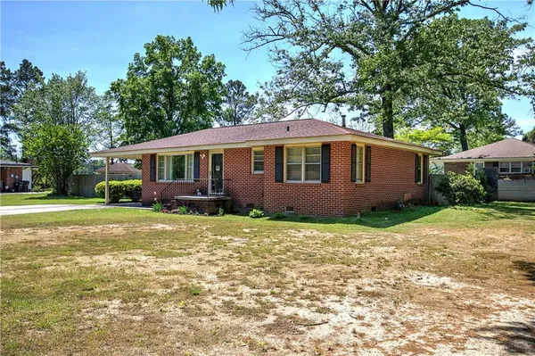 a house view with a garden space