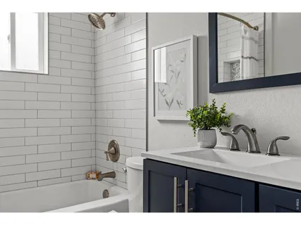 a bathroom with a sink and a bathtub