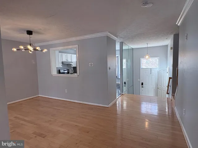 a bathroom with a double vanity sink mirror and bathtub