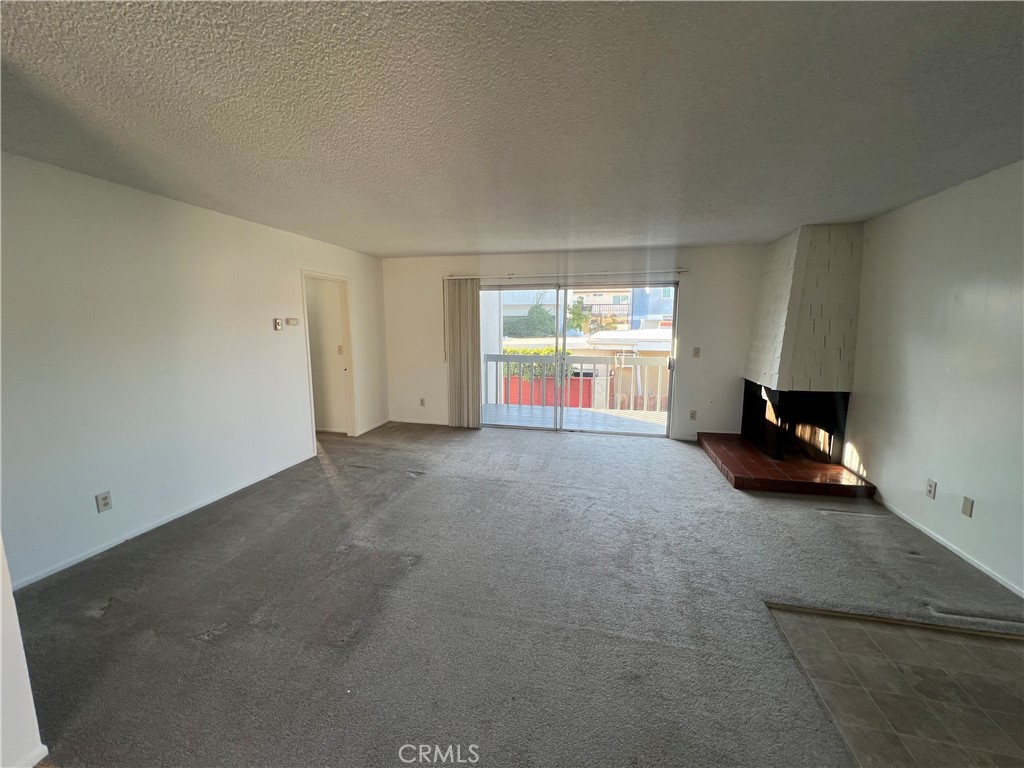 1912 Bataan Road Redondo Beach, CA 90278 - Photo 11 of 37 a view of empty room with a fireplace