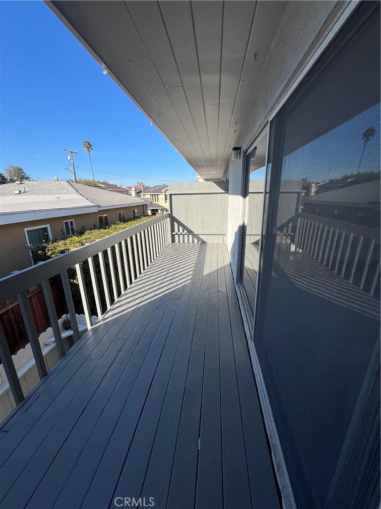 1912 Bataan Road Redondo Beach, CA 90278 - Photo 14 of 37 a view of a balcony with wooden floor
