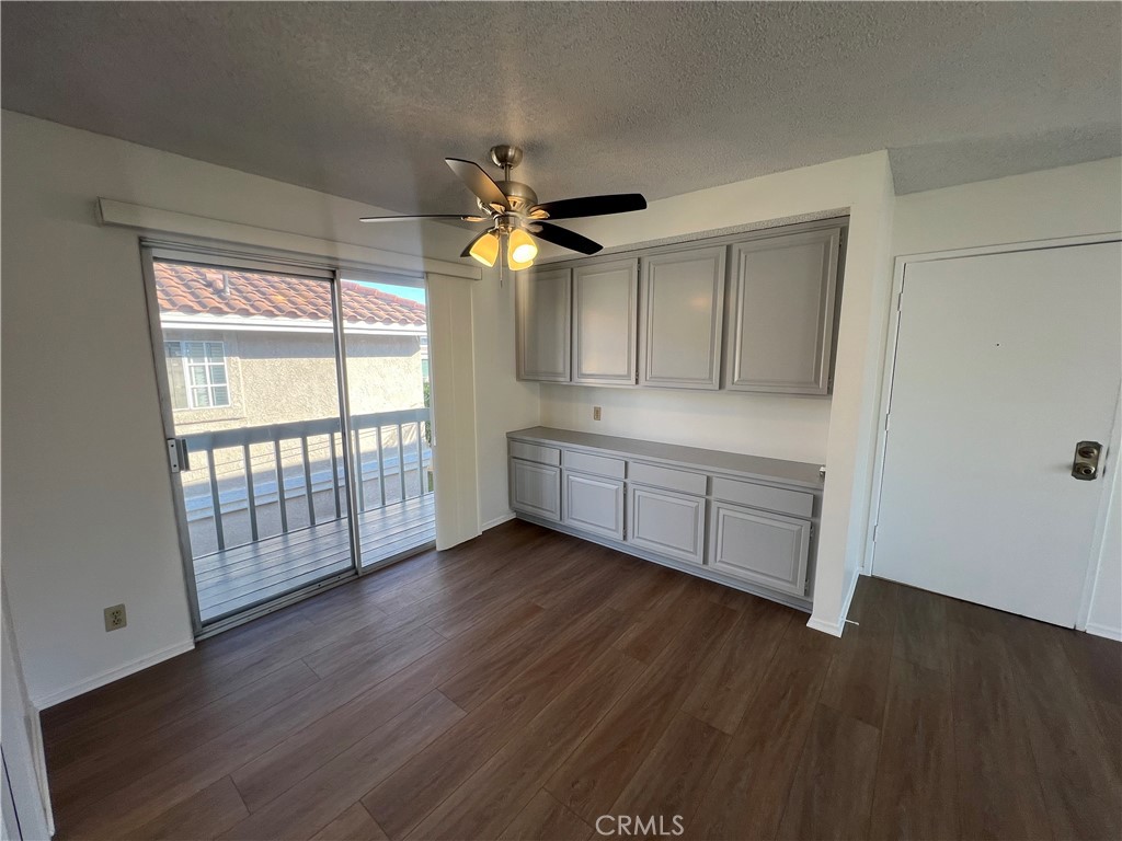 1912 Bataan Road Redondo Beach, CA 90278 - Photo 22 of 37 a view of an empty room with a window and wooden floor