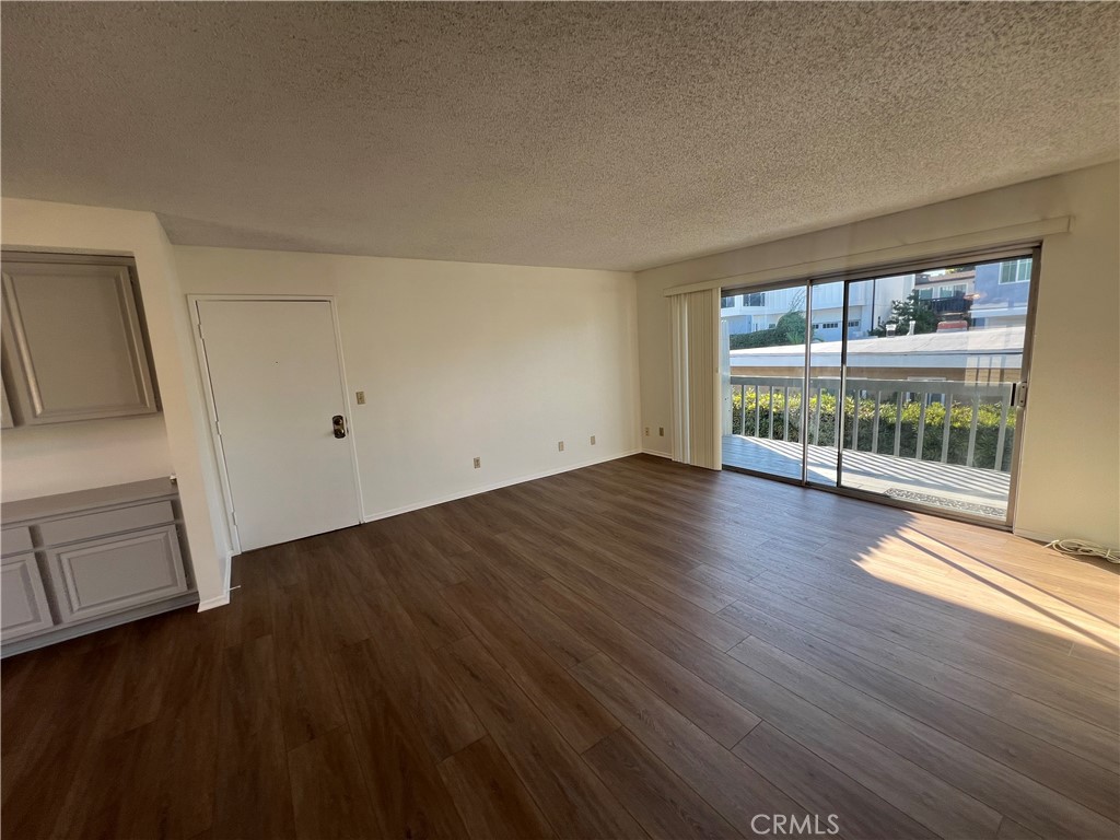 1912 Bataan Road Redondo Beach, CA 90278 - Photo 23 of 37 wooden floor in an empty room with a window