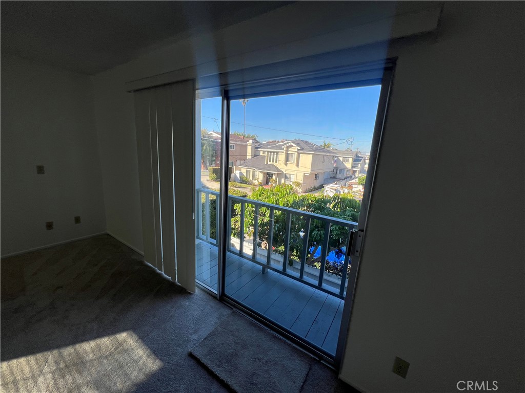 1912 Bataan Road Redondo Beach, CA 90278 - Photo 25 of 37 an empty room with wooden floor and windows